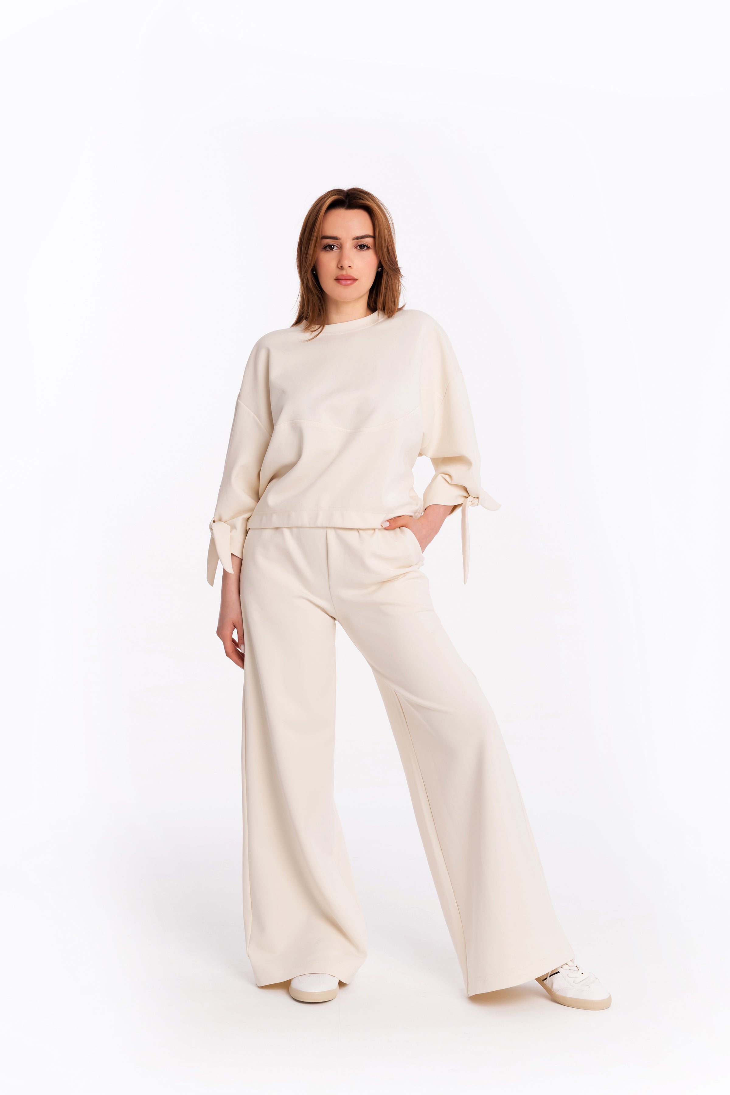 Blouse with bow sleeves in champaign colour Blouse with bow sleeves in champaign colour