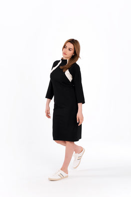 Straight black and white dress with round neckline