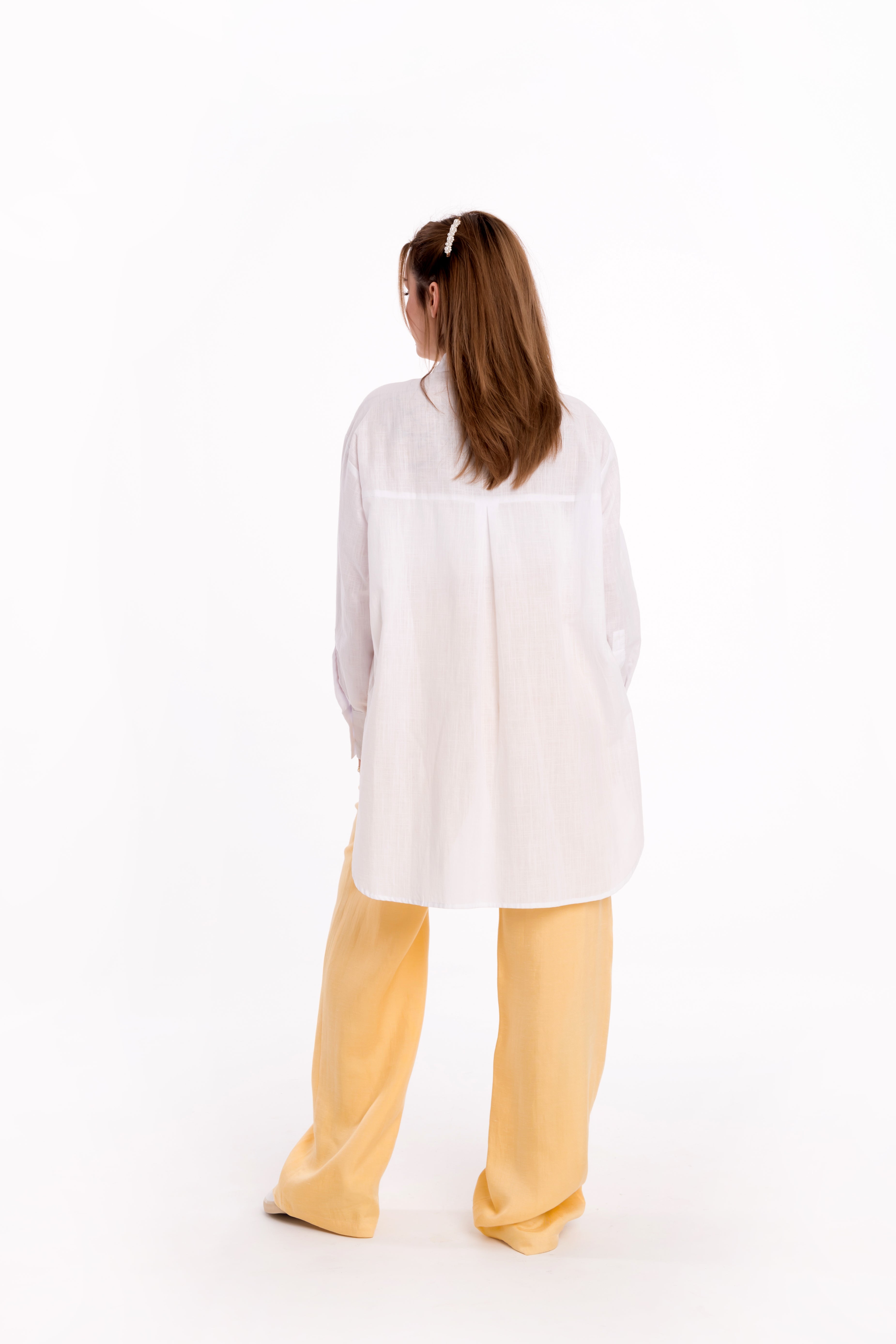 Loose white shirt with long sleeves Loose white shirt with long sleeves