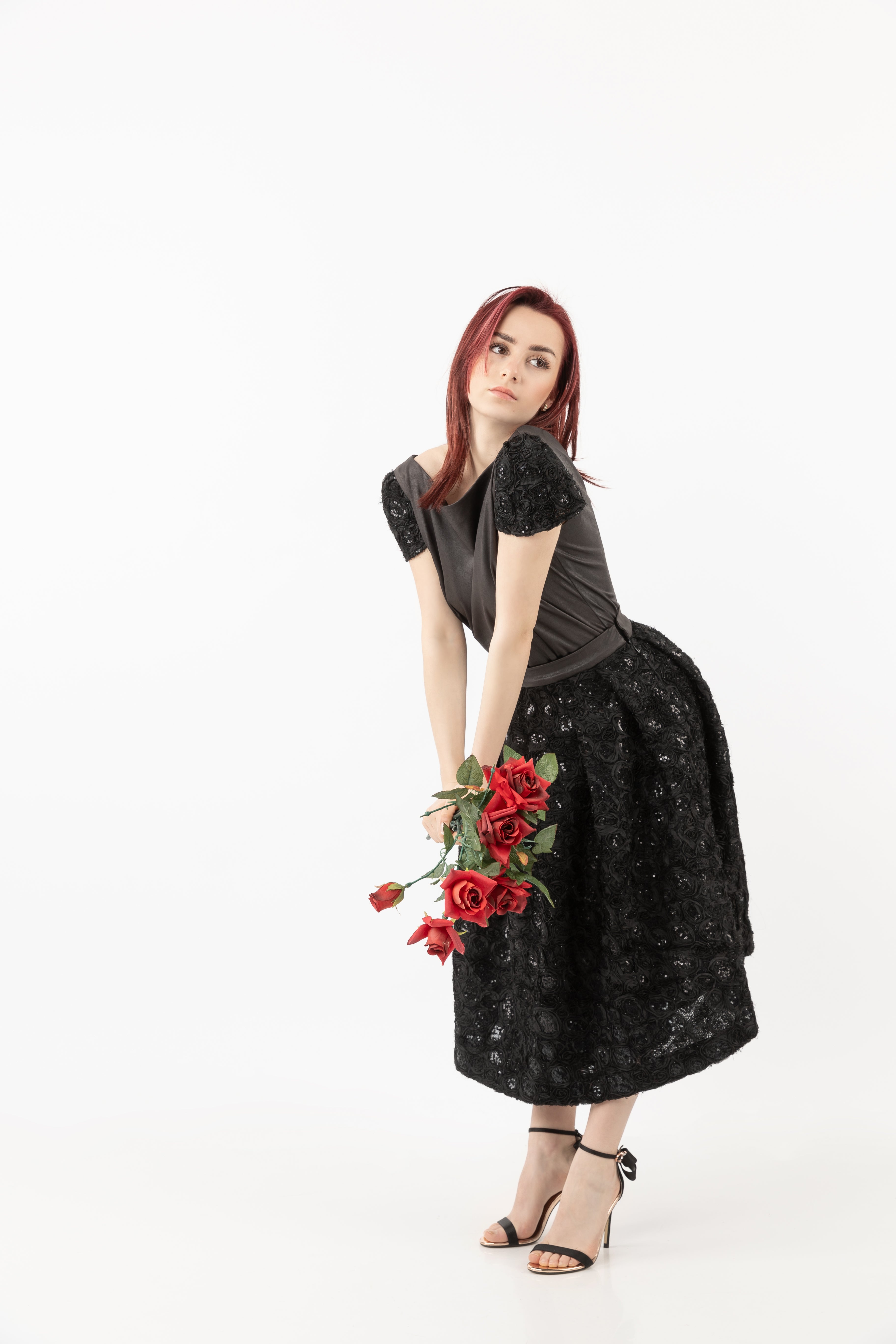 High-waist knee-length skirt with sequences High-waist knee-length skirt with sequences