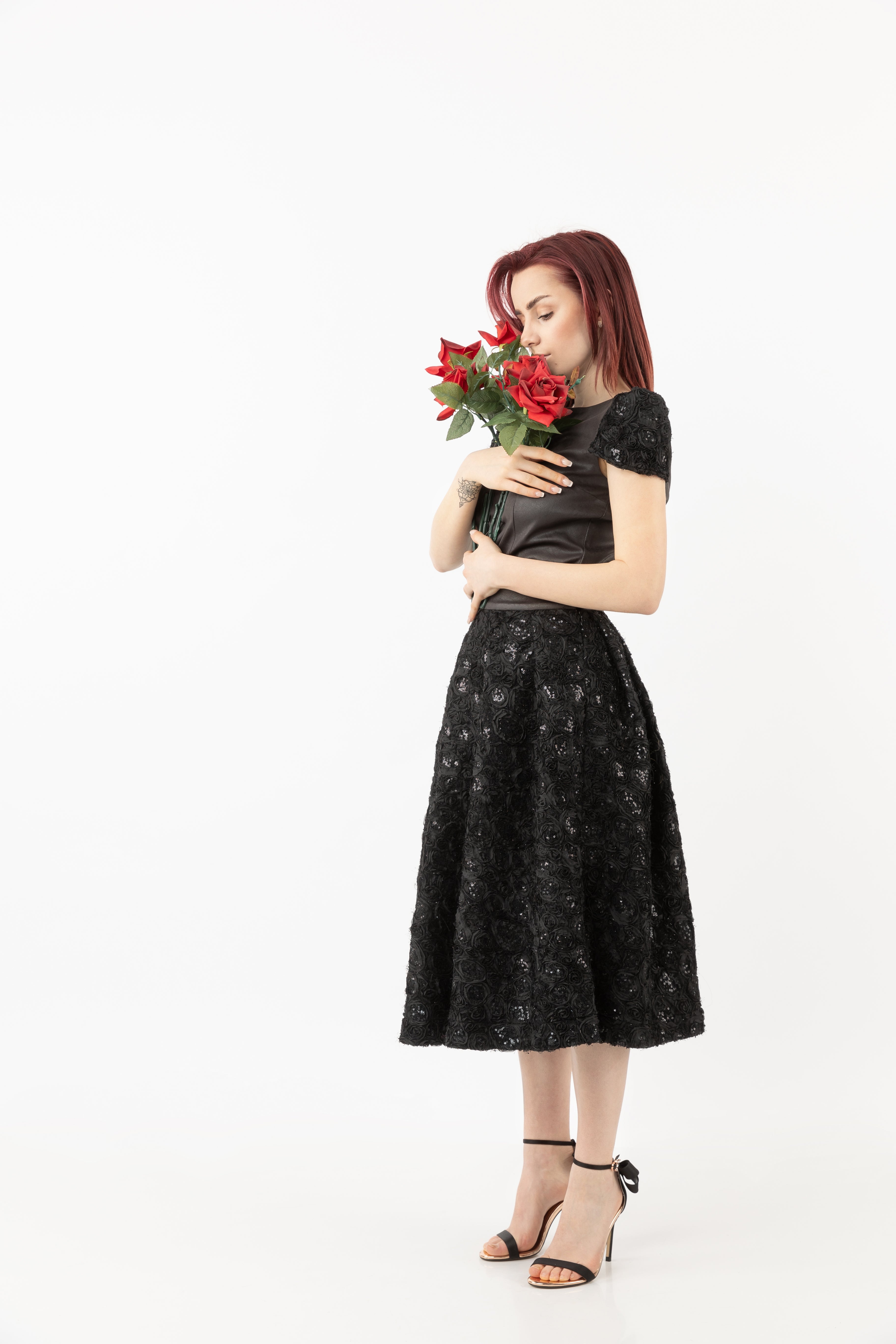 High-waist knee-length skirt with sequences High-waist knee-length skirt with sequences