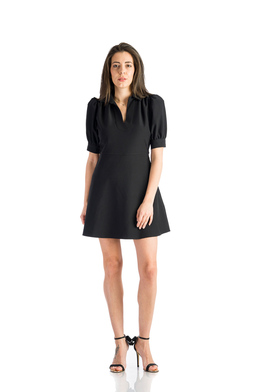 Black dress with short buff sleeves Black dress with short buff sleeves – Back view – Silvy Rowson