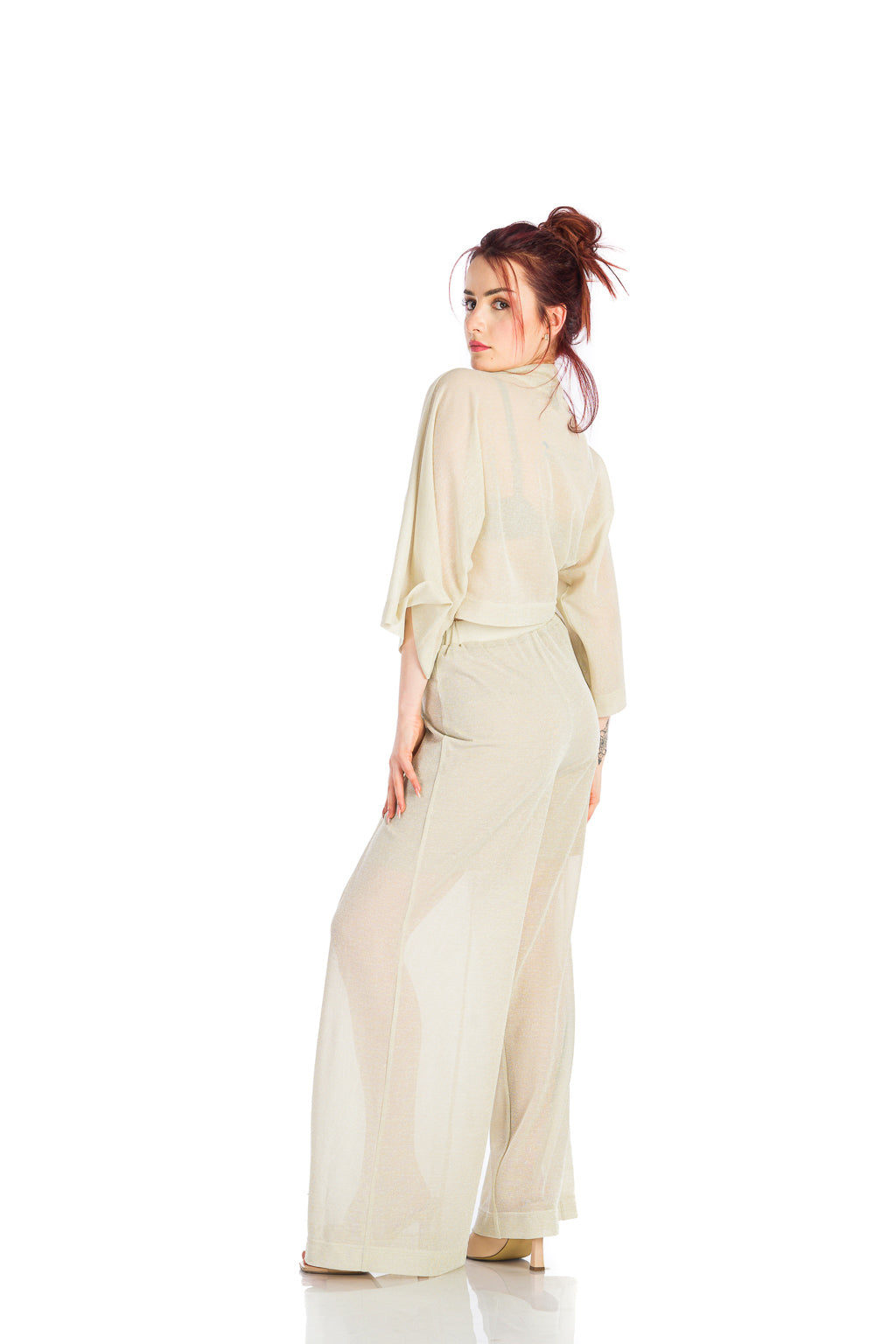 Pants in beige mesh with a loose design Pants in beige mesh with a loose design