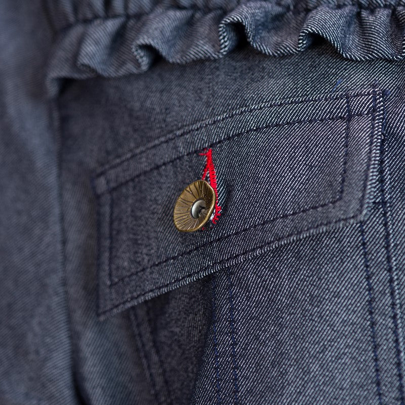 Giubbino corto con arricciatura sul davanti in colore blu scuro Giubbino corto con arricciatura sul davanti in colore blu scuro