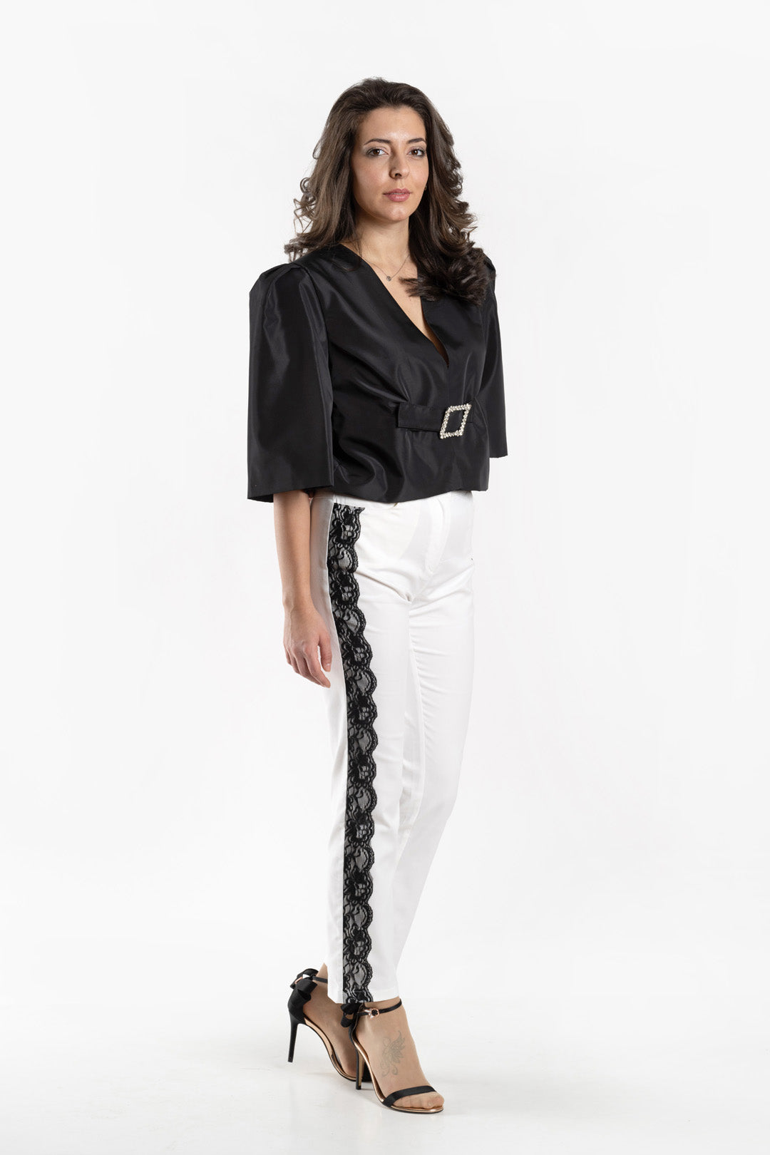 Straight trousers with black lace edging Straight trousers with black lace edging