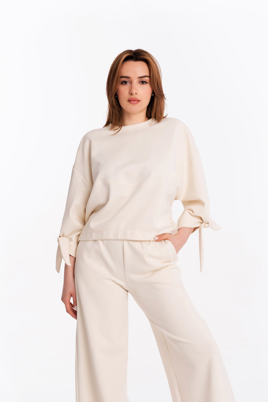 Blouse with bow sleeves in champaign colour