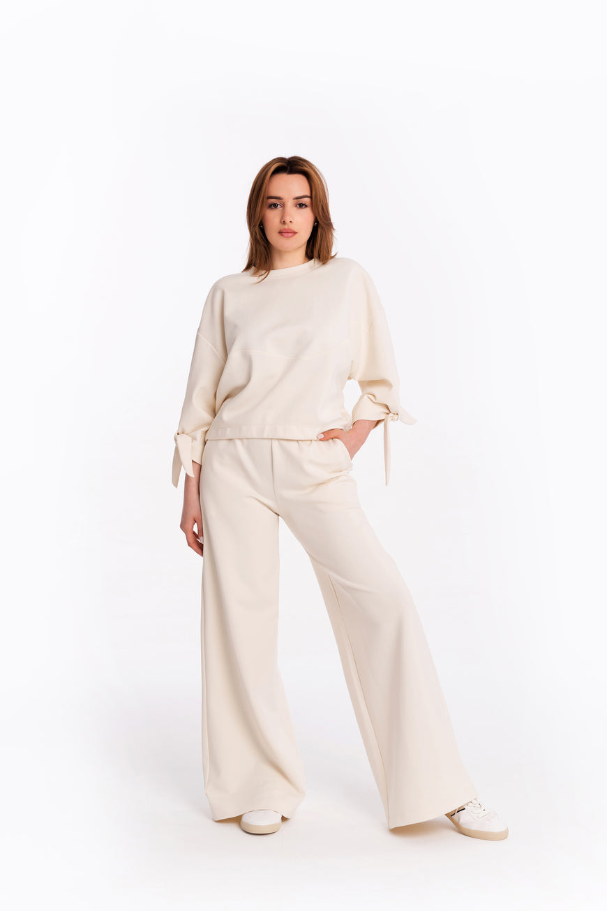 Blouse with bow sleeves in champaign colour