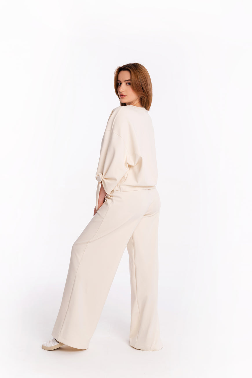 Blouse with bow sleeves in champaign colour