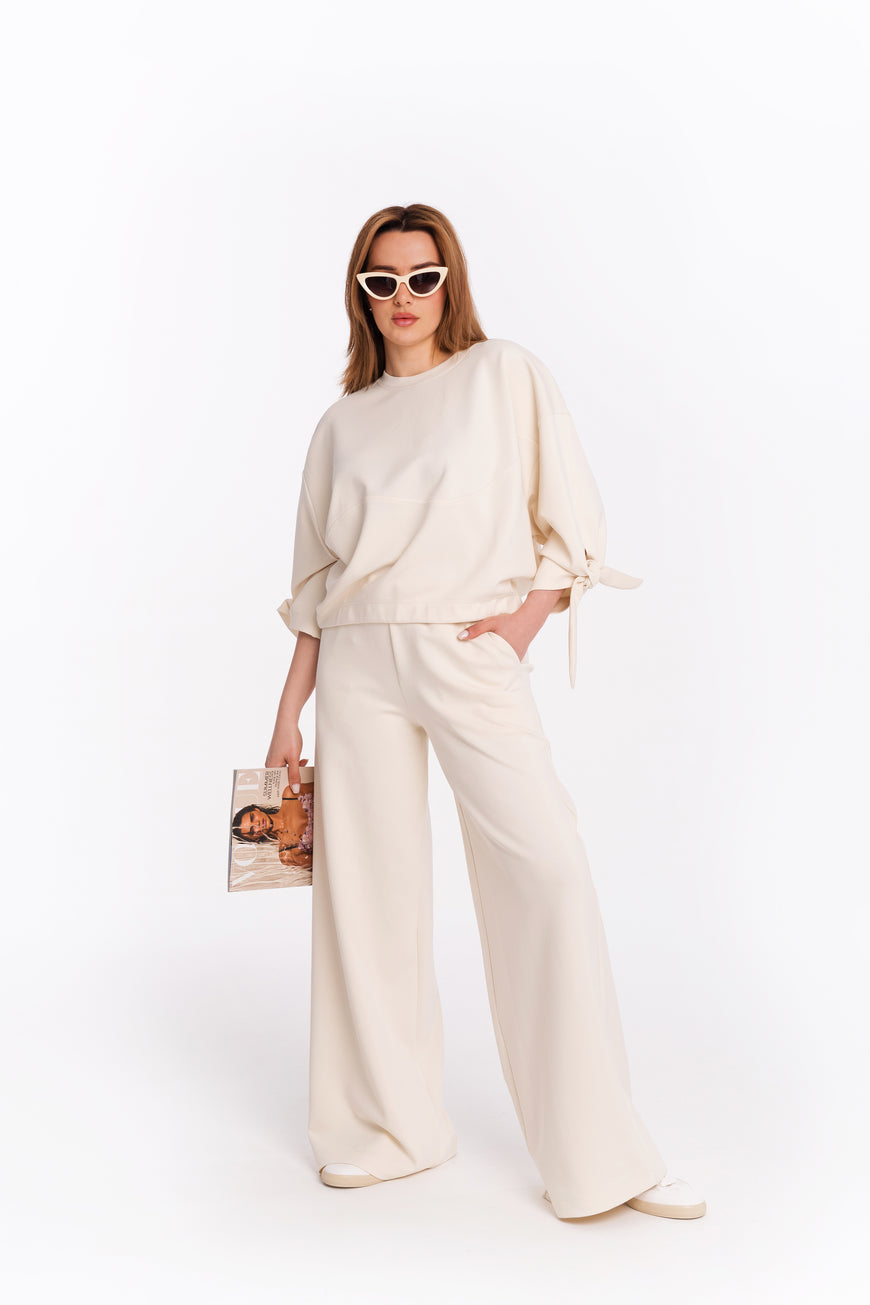 Blouse with bow sleeves in champaign colour