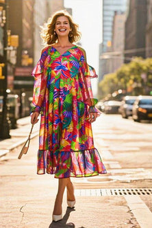 Off-shoulder dress with ruffles in tropic orange