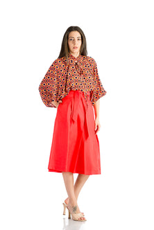 Orange loose blouse with balloon sleeves