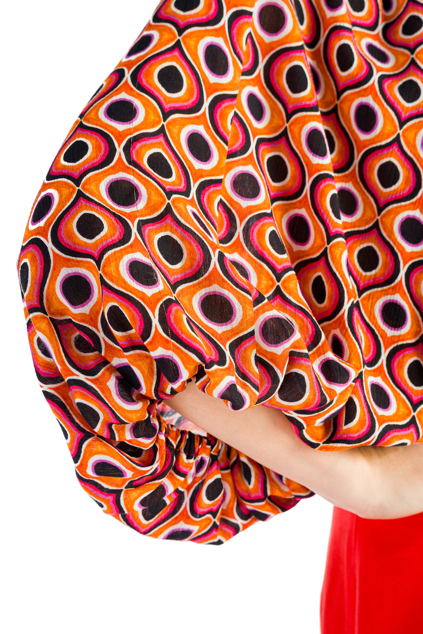 Orange loose blouse with balloon sleeves