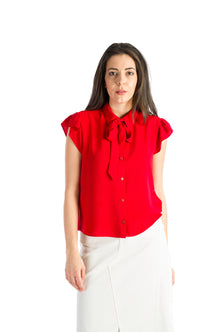 Sleeveless shirt with ruffles in red