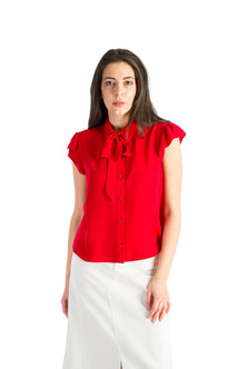 Sleeveless shirt with ruffles in red