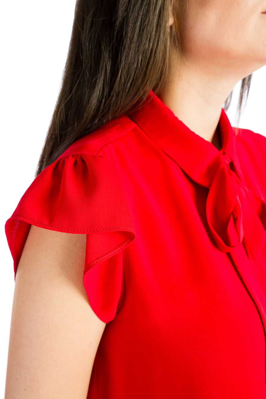Sleeveless shirt with ruffles in red