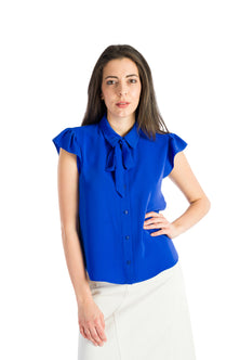 Sleeveless shirt with ruffles in blue