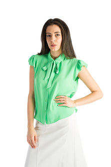 Sleeveless shirt with ruffles in green