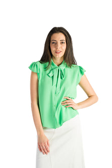 Sleeveless shirt with ruffles in green