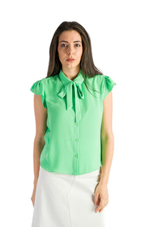 Sleeveless shirt with ruffles in green – Styled full look – Silvy Rowson